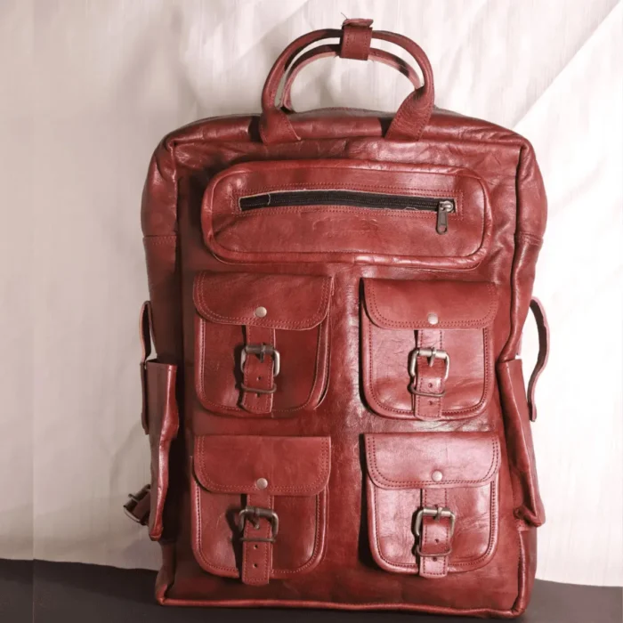 Seven pocket brick brown leather backpack